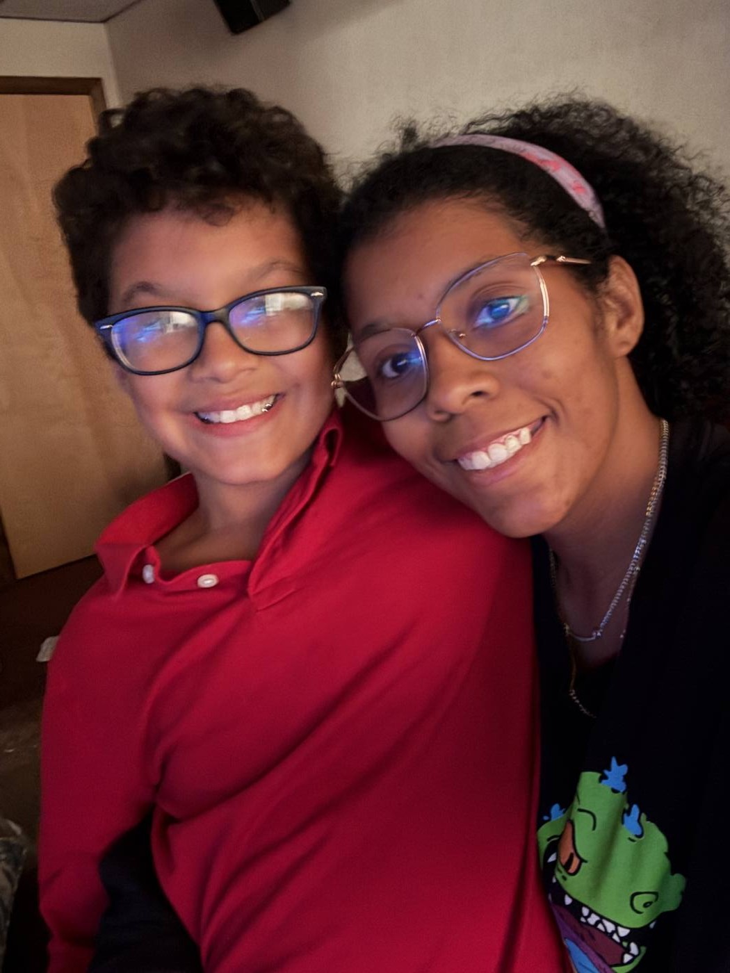 Zee and her son smiling