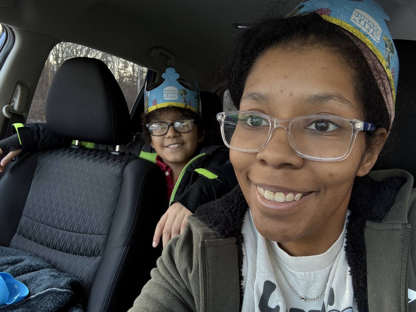 Zee and her son in the car